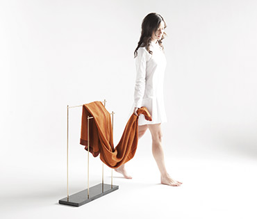 Marblelous Rack - For your most precious textiles. Rack with blanket and girl.