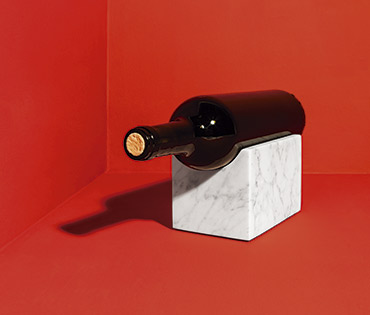 wine holder with red wine bottle